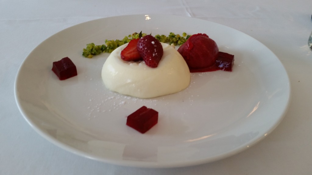 A sublime vanilla panna cotta with rose and strawberry sorbet, pistachio and rose jelly.