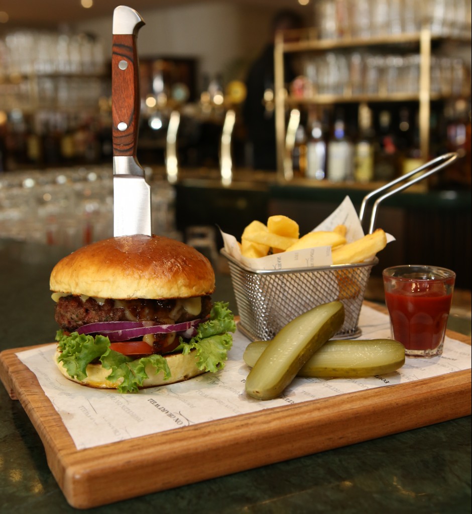 To eat this burger you need a big mouth - or that rather lethal looking knife 