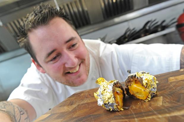 Matt and his millionaire Christmas pudding, which doesn't look particularly appealing. considering the cost involved 