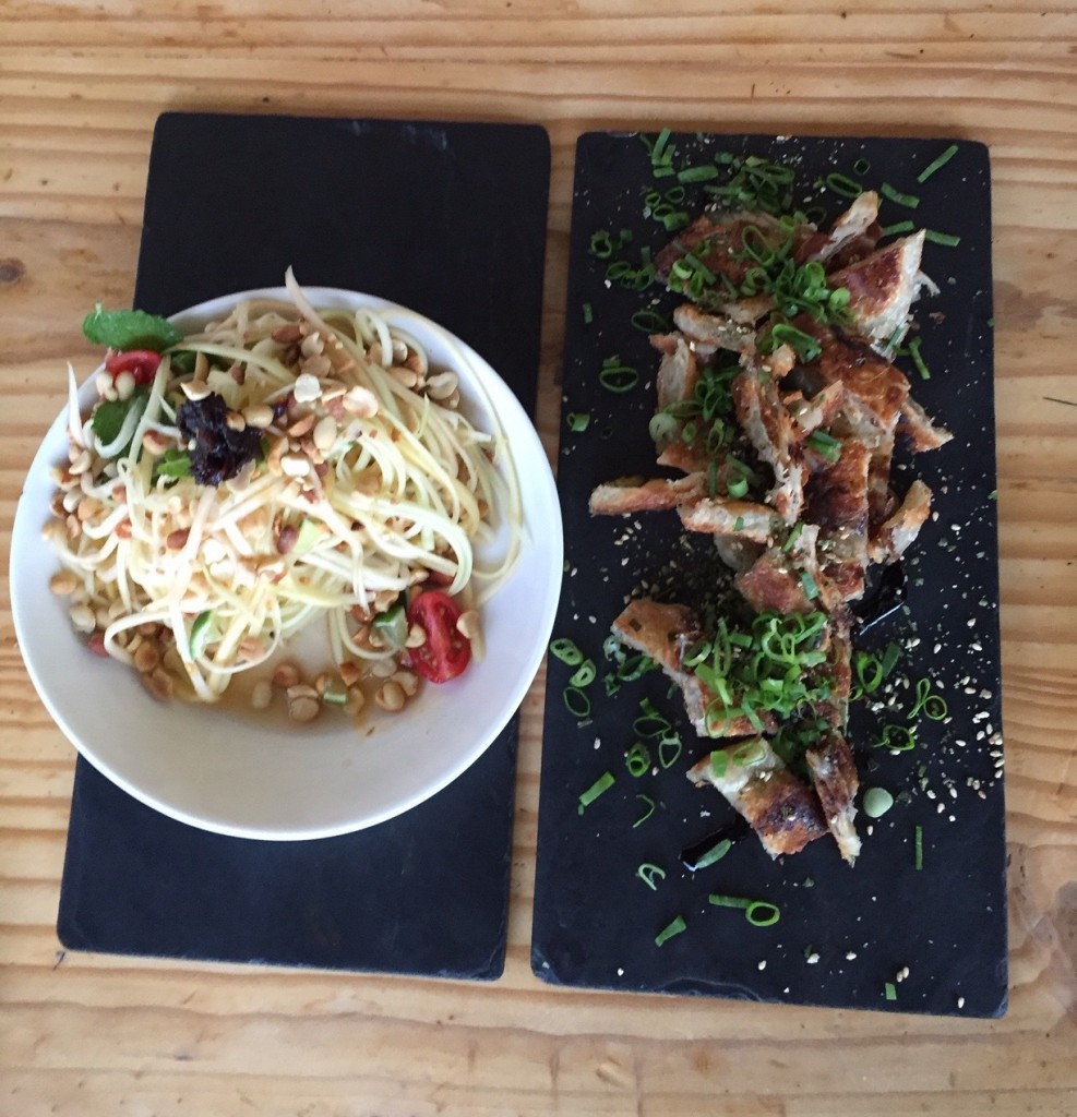 Scallion pancakes (right) and a green papaya side salad