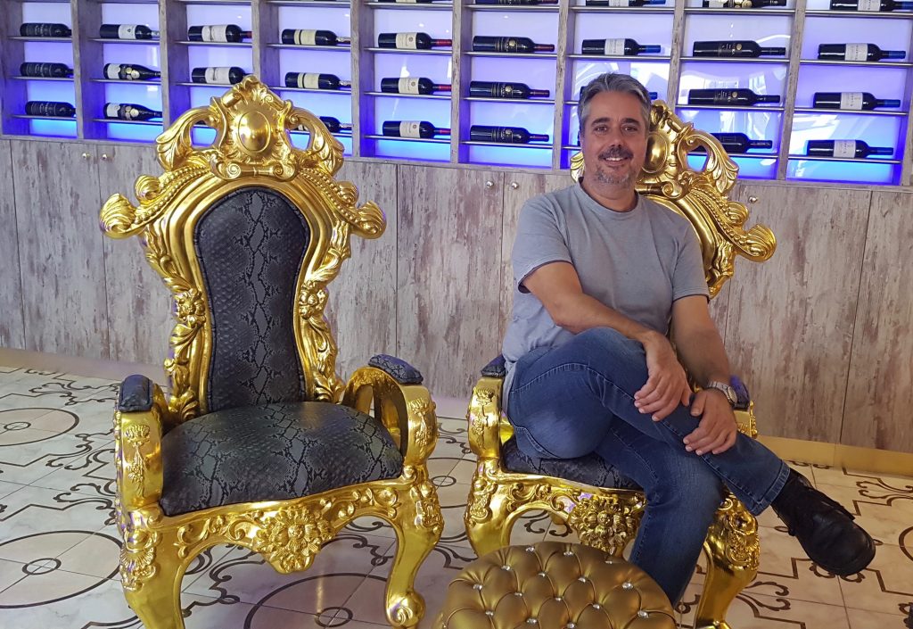 Frank Chemaly at home on the throne